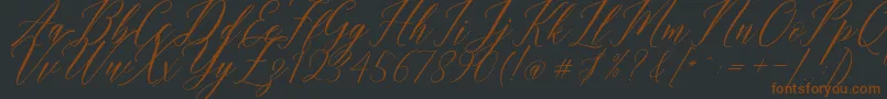 Humairah Script-fontti – ruskeat fontit mustalla taustalla