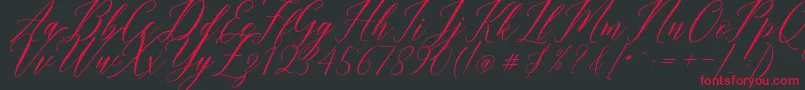 Шрифт Humairah Script – красные шрифты на чёрном фоне