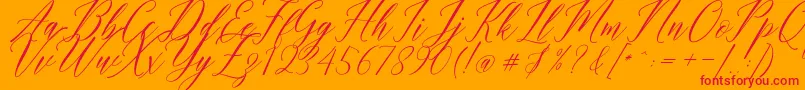 Humairah Script Font – Red Fonts on Orange Background