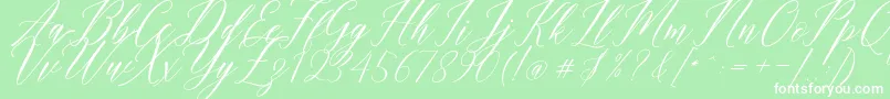 Fonte Humairah Script – fontes brancas em um fundo verde