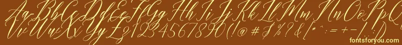 Шрифт Humairah Script – жёлтые шрифты на коричневом фоне