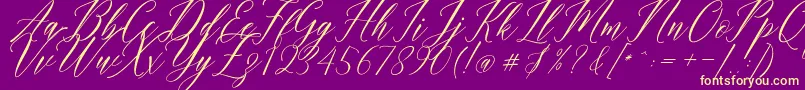 Humairah Script-Schriftart – Gelbe Schriften auf violettem Hintergrund