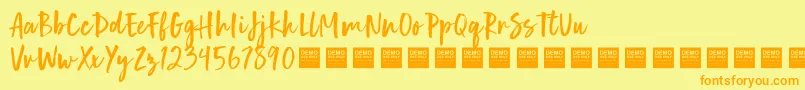 Fonte Human Nature   Demo – fontes laranjas em um fundo amarelo