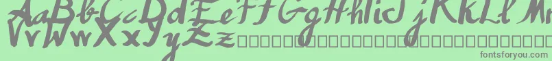 Humana Font – Gray Fonts on Green Background