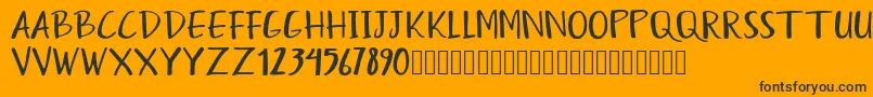Humayra Font – Black Fonts on Orange Background