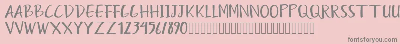 Humayra Font – Gray Fonts on Pink Background