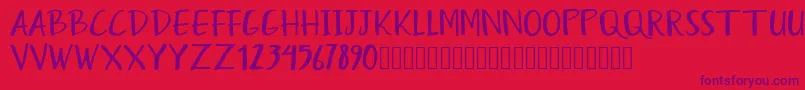 Humayra Font – Purple Fonts on Red Background