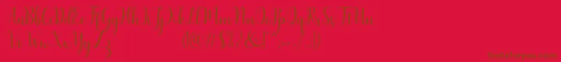 Fonte Humble Script – fontes marrons em um fundo vermelho