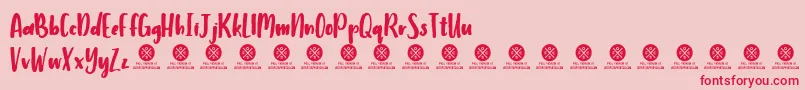 Humbley Script Demo Font – Red Fonts on Pink Background