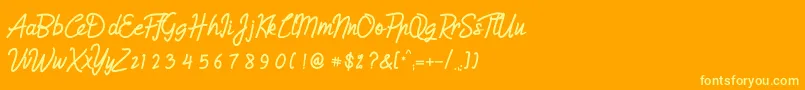 Humienly Font – Yellow Fonts on Orange Background