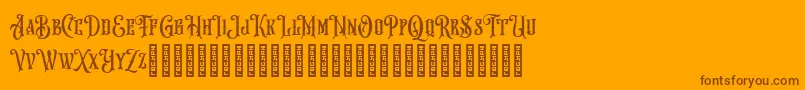 Hungry Beast-Schriftart – Braune Schriften auf orangefarbenem Hintergrund