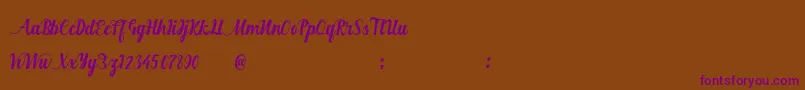 Hurringtown-Schriftart – Violette Schriften auf braunem Hintergrund