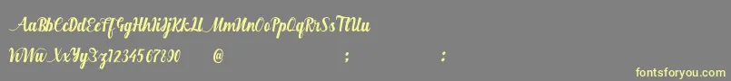 Hurringtown Font – Yellow Fonts on Gray Background