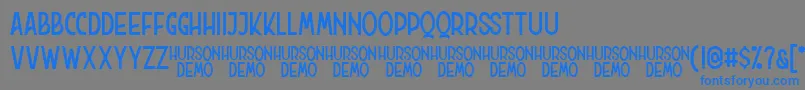 Hurson Clean Font – Blue Fonts on Gray Background