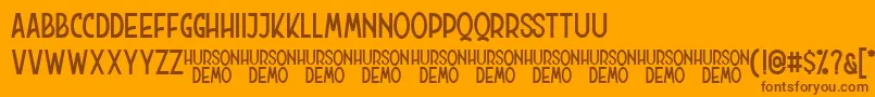 Hurson Clean Font – Brown Fonts on Orange Background