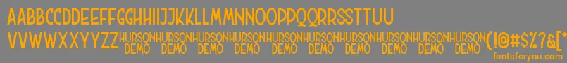 Hurson Clean Font – Orange Fonts on Gray Background