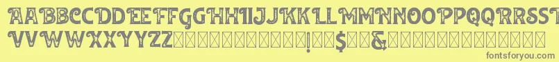 フォントHuvet Roughfree – 黄色の背景に灰色の文字