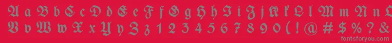 フォントWieynckfrakturGesperrtfettunz1l – 赤い背景に灰色の文字