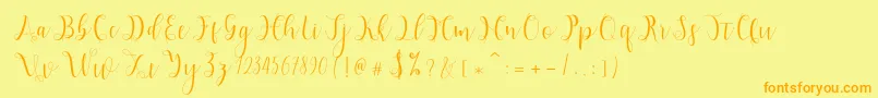 フォントHypatia – オレンジの文字が黄色の背景にあります。