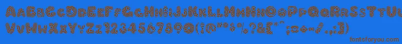 Hypmotizin Font – Brown Fonts on Blue Background