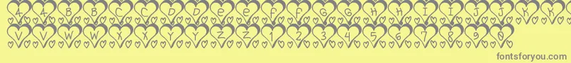 フォントI love St – 黄色の背景に灰色の文字