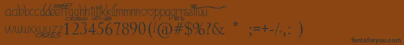 I Love What You Do  -fontti – mustat fontit ruskealla taustalla