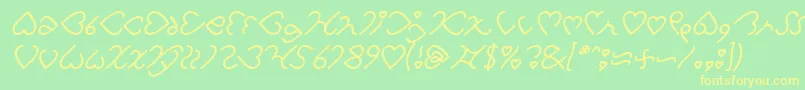 Fonte I Love You Italic – fontes amarelas em um fundo verde