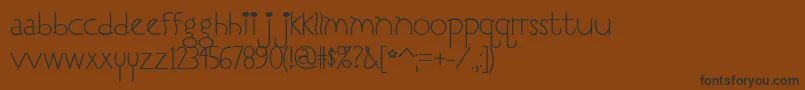 フォントI Love You, Monkey – 黒い文字が茶色の背景にあります
