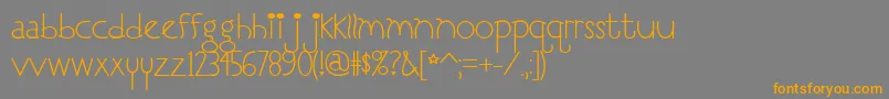 フォントI Love You, Monkey – オレンジの文字は灰色の背景にあります。