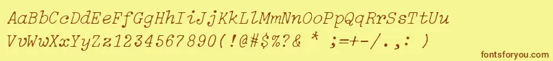 Fonte IBM Selectric Light Italic – fontes marrons em um fundo amarelo