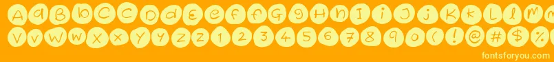 Iced Cookies-fontti – keltaiset fontit oranssilla taustalla