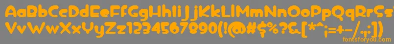 フォントicedrop bold – オレンジの文字は灰色の背景にあります。