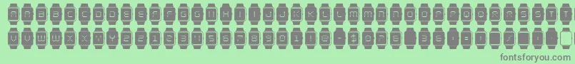 ichrono-Schriftart – Graue Schriften auf grünem Hintergrund