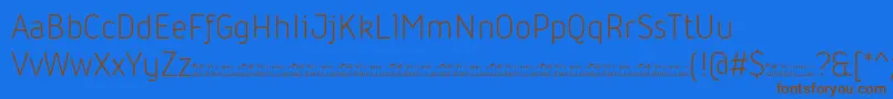 Шрифт Iconic Light trial – коричневые шрифты на синем фоне
