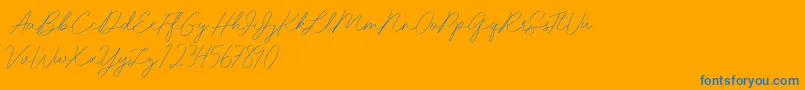 Idana Luisa free-Schriftart – Blaue Schriften auf orangefarbenem Hintergrund