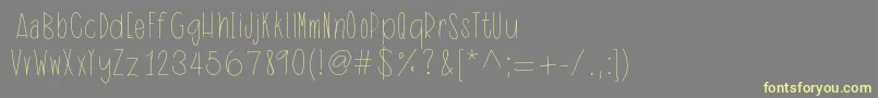 IdentityTheft Font – Yellow Fonts on Gray Background