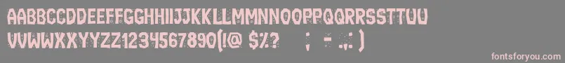 IgnorantBook-Schriftart – Rosa Schriften auf grauem Hintergrund