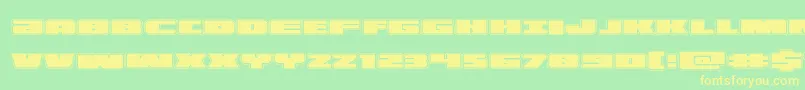 フォントilluminoacad – 黄色の文字が緑の背景にあります