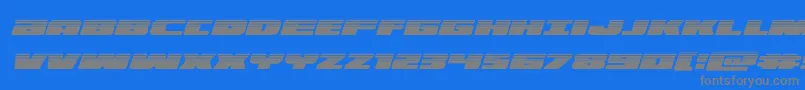 フォントilluminohalfital – 青い背景に灰色の文字