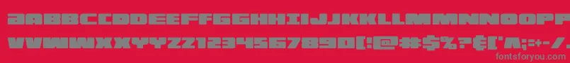 フォントilluminoxtracond – 赤い背景に灰色の文字
