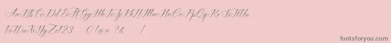 imata Script DEMO-Schriftart – Graue Schriften auf rosa Hintergrund