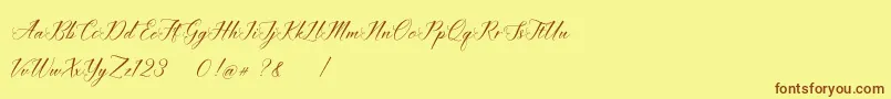 Шрифт imata Script DEMO – коричневые шрифты на жёлтом фоне