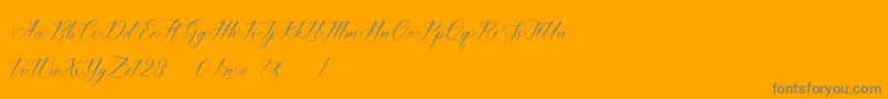Шрифт imata Script DEMO – серые шрифты на оранжевом фоне