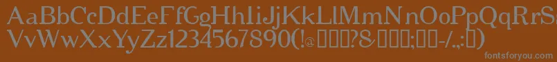 フォントCipher – 茶色の背景に灰色の文字