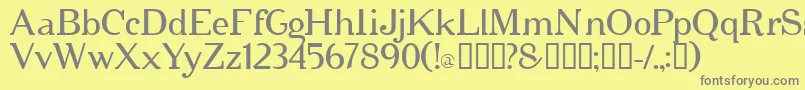 フォントCipher – 黄色の背景に灰色の文字