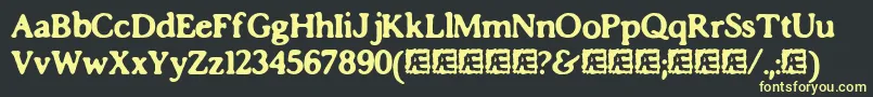 フォントimposs – 黒い背景に黄色の文字