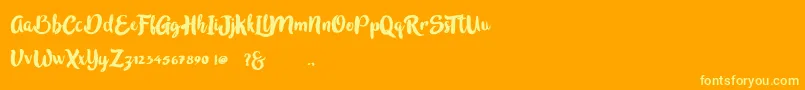 Czcionka inblossom – żółte czcionki na pomarańczowym tle