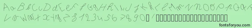 フォントInclinedletter – 緑の背景に黒い文字