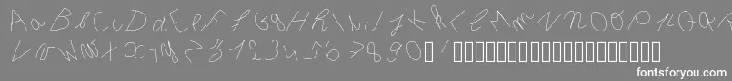 フォントInclinedletter – 灰色の背景に白い文字