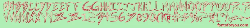 incubus shadow-Schriftart – Rote Schriften auf grünem Hintergrund